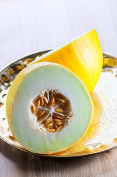 Cross Section of a honeydew melon on a table