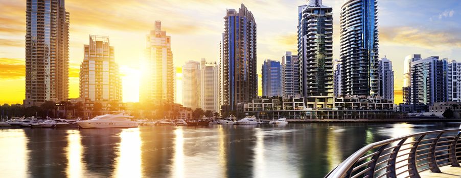 skyline of Dubai Marina at night with boats, United Arab Emirates, Middle East