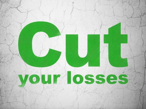 Finance concept: Green Cut Your losses on textured concrete wall background