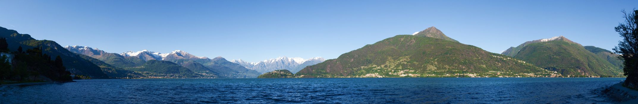 Pianello del Lario, Lake of Como, Italy: Panorama of the Lake of Como from the Beach at evening sunlight