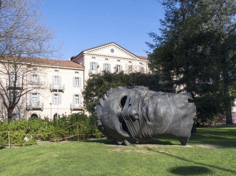 Lugano, Switzerland: Famous monument shaped head called "Eros Blindfolded" artist Igor Mitoraj, laid in honor of the exhibition season in 2002 sponsored by the Museum of Modern Art of the City of Lugano