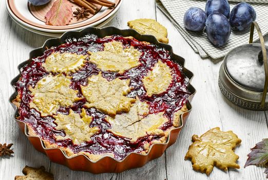 Harvest pie with autumn plums with autumn style