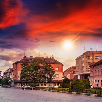 area of ​​the old city near the park wrapped by cobbled street at sunset