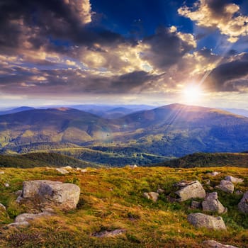 white sharp stones on the hillside at sunset