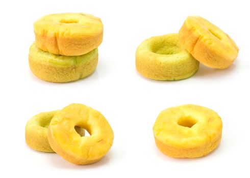 set of yellow and green donut cake isolated on white