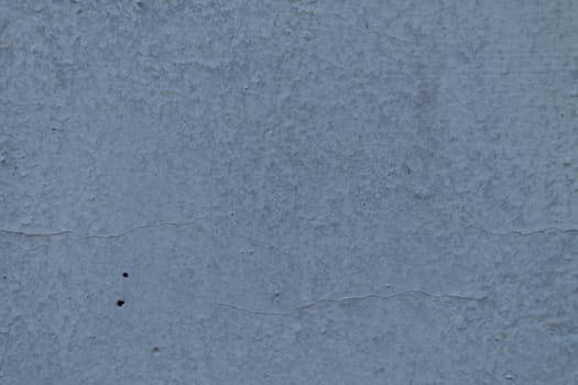 the texture of the wall,the little white tiles.