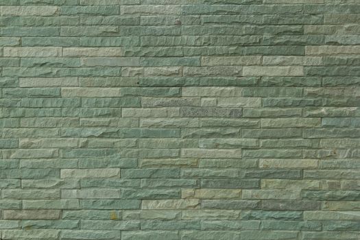 green decorative stone wall texture background