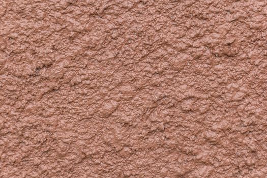 Brown bump plaster wall coating with oil paint texture
