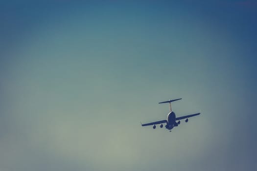 Passenger aircraft flying in the blue sky