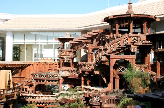 The wooden designs imitating old traditions in construction of wooden constructions in hotel in Egypt