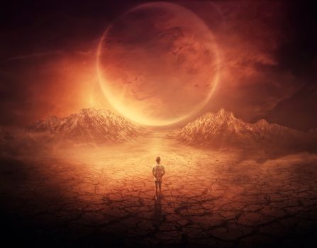 Surreal background as a young boy walks on another planet with dry and cracked ground, following a shining space object in the sky.