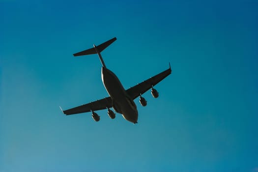 Passenger aircraft flying in the blue sky