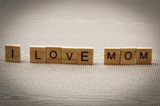 I love mom wording on corrugated paper background, Mother's day concept.