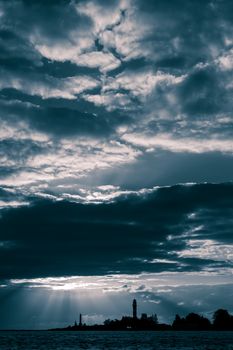 Dark blue sunset sky over the town silhouette