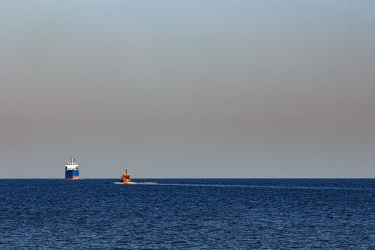 Blue cargo ship sailing from the Baltic sea
