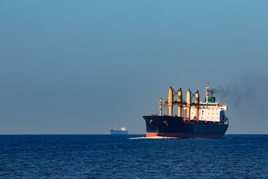 Black cargo ship sailing from the Baltic sea