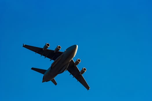 Passenger aircraft flying in the blue sky