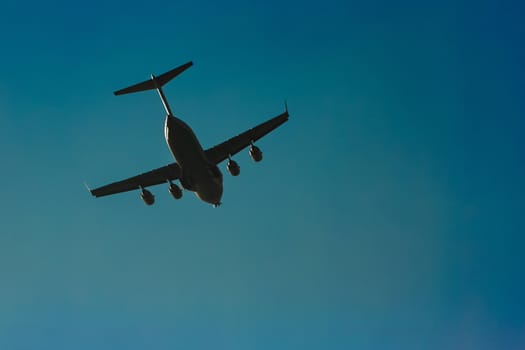 Passenger aircraft flying in the blue sky