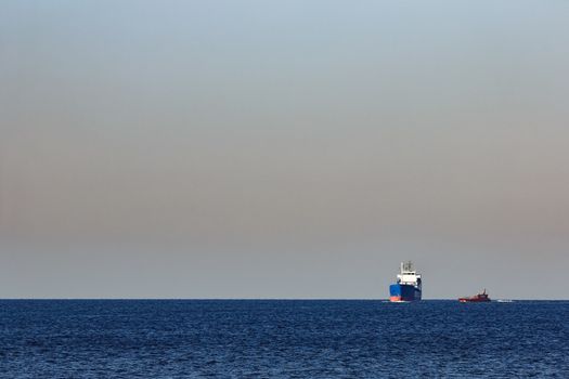 Blue cargo ship sailing from the Baltic sea