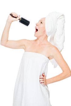 The girl sings in a hairbrush instead of a microphone in the shower