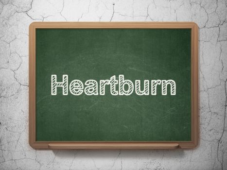 Medicine concept: text Heartburn on Green chalkboard on grunge wall background, 3D rendering