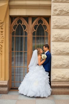 Newlyweds on a walk in the park on a warm sunny day