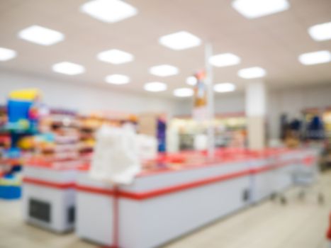Abstract blurred supermarket with colorful shelves as background