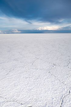 Sunset in Salar de Uyuni salt flats desert, Andes Altiplano, Bolivia