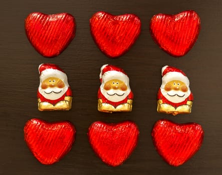 composition of red hearts and Santa Claus