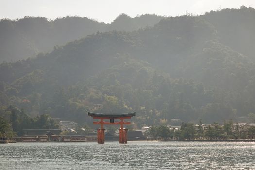 Floating gate (Giant Torii) of Itsukushima Shrine in Hiroshima, Japan. The temple is a UNESCO World Heritage Site.