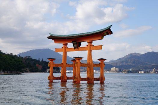 Floating gate (Giant Torii) of Itsukushima Shrine in Hiroshima, Japan. The historic shrine complex is listed as a UNESCO World Heritage Site.