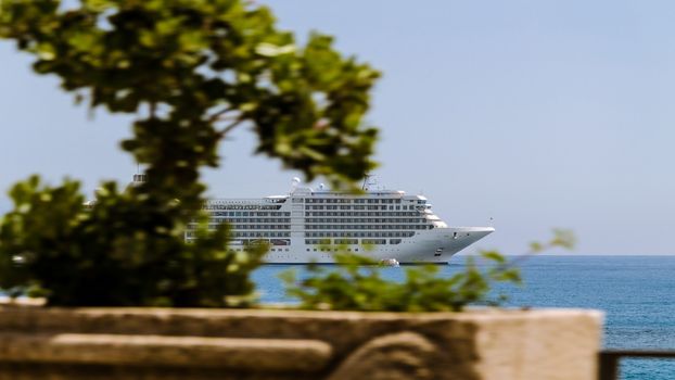 Cruise ship anchored off the Bay of Taormina (Italy)