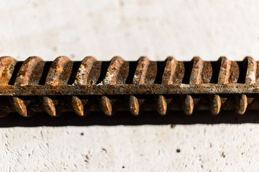 Close-up of a rusty steel reinforcement bar.
