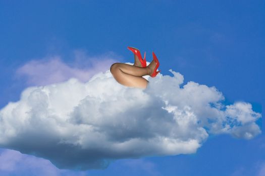 White clouds against a blue sky. Above the cloud, women's legs are visible.