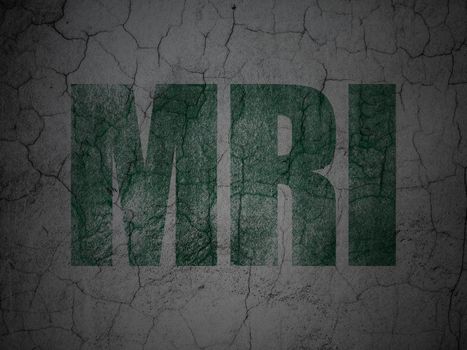 Health concept: Green MRI on grunge textured concrete wall background