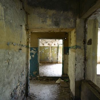 wide angle view of an old wall abandoned factory building