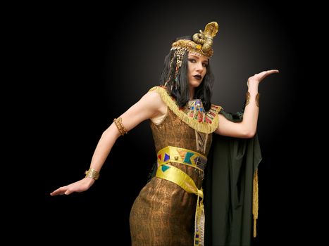 young girl dressed in Cleopatra costume, pose, studio shot,