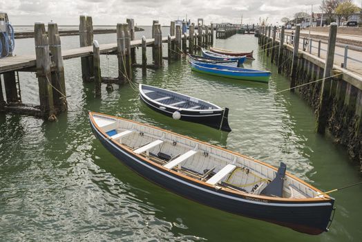 Rowing boats in the harbour of West Terschelling on the island of Terschelling in the North of the Netherlands
