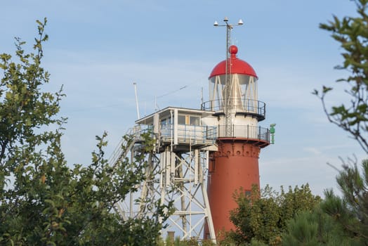 The cast iron lighthouse on the wadden Island Vlieland, near the village Oost-Vlieland located on the so called Vuurboetsduin in the Netherlands
