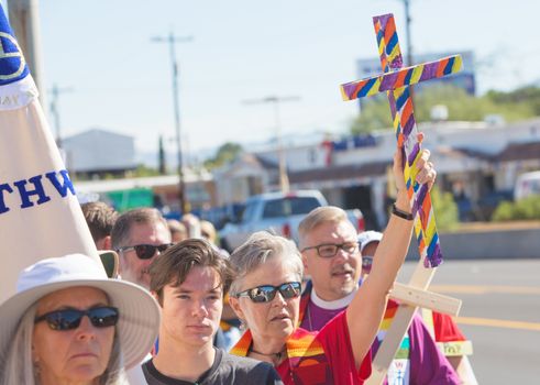 NOGALES, AZ - OCTOBER 08: Laypersons and clergy members holding Christian crosses at border policy protest march on October 08, 2016 in Nogales, AZ, USA.