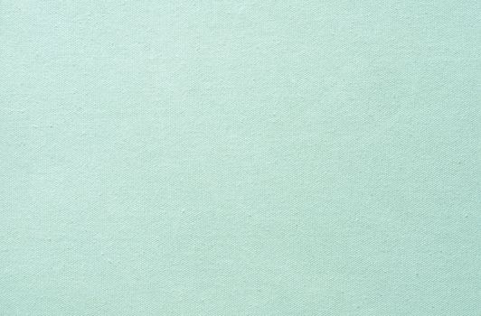 green pastel fabric background and texture