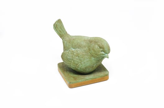 Bird statue on white background