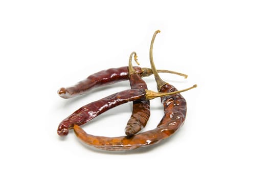 dried red chili pepper on white background