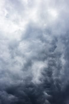 Abstract background, dark sky with clouds close-up