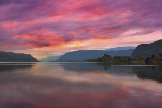 Colorful sunrise at Columbia River Gorge with view of Crown Point and Rooster Rock