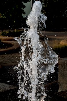 Water shooting out of a fountain, caught in mid-flight.