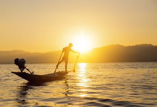 Fisherman of Lake in action when fishing, Myanmar (Burma)