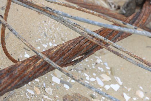 Steel rusty wire and wire on a concrete background.