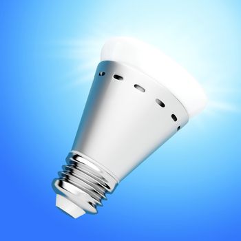 Bright LED light bulb on blue background