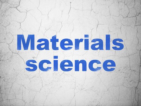 Science concept: Blue Materials Science on textured concrete wall background